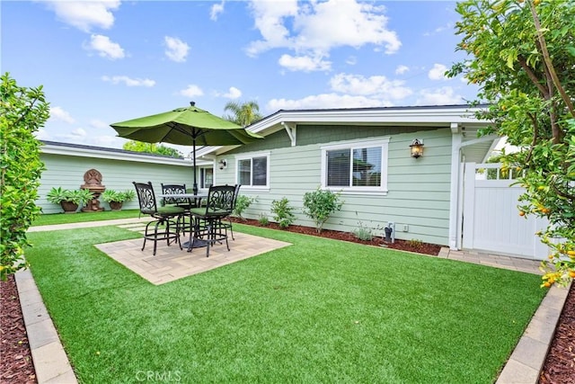 249 Loyola Rd, Costa Mesa, CA 92626 - back of house with a patio and a yard