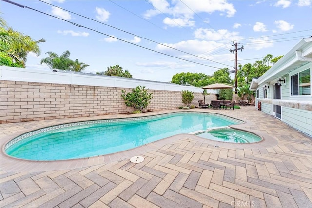 249 Loyola Rd, Costa Mesa, CA 92626 - view of swimming pool featuring a patio area, a pool with connected hot tub, and a fenced backyard
