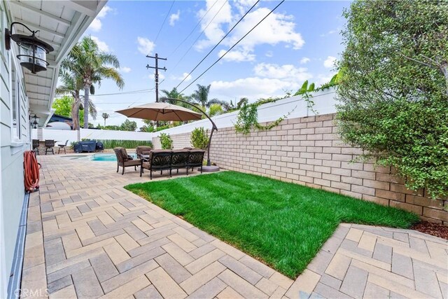 249 Loyola Rd, Costa Mesa, CA 92626 - fenced backyard featuring a patio area