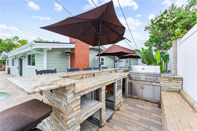 249 Loyola Rd, Costa Mesa, CA 92626 - wooden terrace with a patio