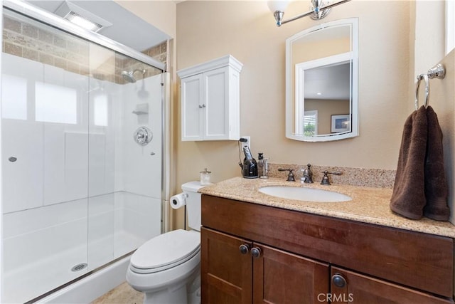 249 Loyola Rd, Costa Mesa, CA 92626 - bathroom with a shower stall, toilet, vanity, and plenty of natural light
