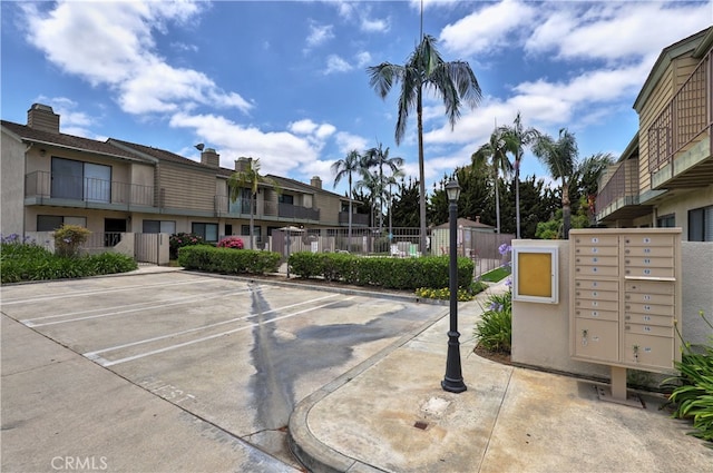 7068 Cerritos Ave Unit 16, Stanton, CA 90680 - view of property's community featuring mail area, uncovered parking, and a residential view
