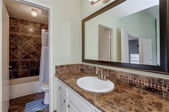 7068 Cerritos Ave Unit 16, Stanton, CA 90680 - bathroom featuring vanity, toilet, shower / bath combo, and backsplash