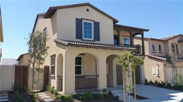7739 Lupin St, Chino, CA 91708 - mediterranean / spanish-style home with an attached garage, concrete driveway, a tiled roof, and stucco siding