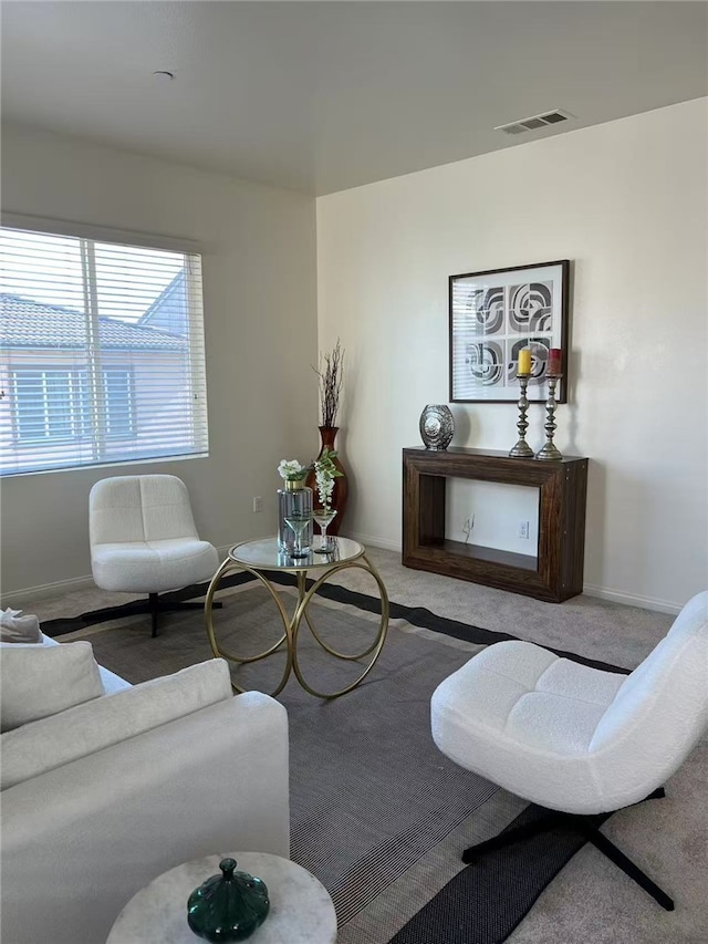 7739 Lupin St, Chino, CA 91708 - living room featuring carpet flooring and baseboards
