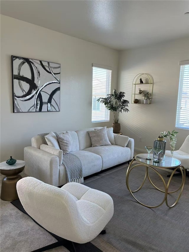 7739 Lupin St, Chino, CA 91708 - living room featuring plenty of natural light and carpet floors