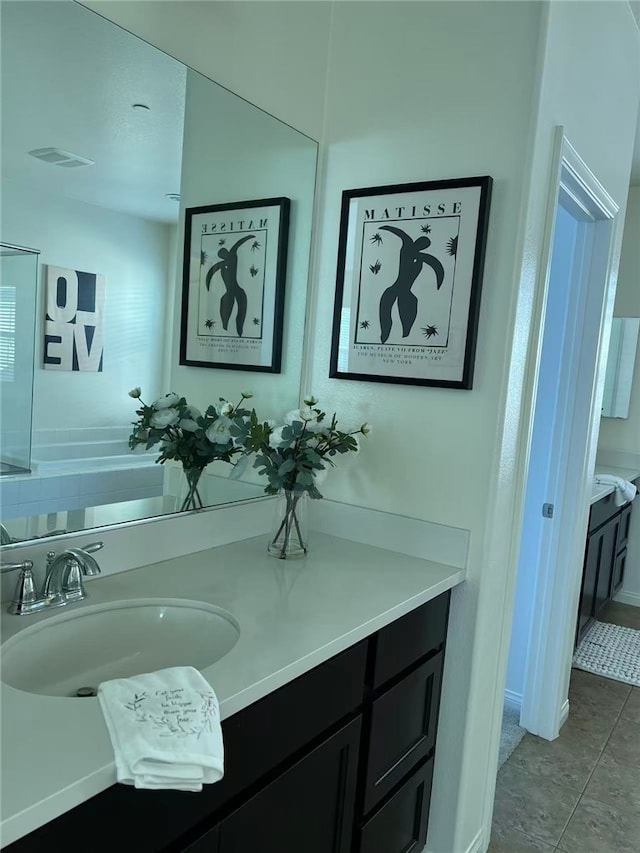 7739 Lupin St, Chino, CA 91708 - bathroom with vanity and tile patterned floors