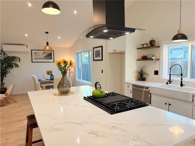 1254 W Van Koevering St, Rialto, CA 92376 - kitchen with wall chimney exhaust hood, dishwasher, a kitchen island, light wood-style floors, and light stone countertops