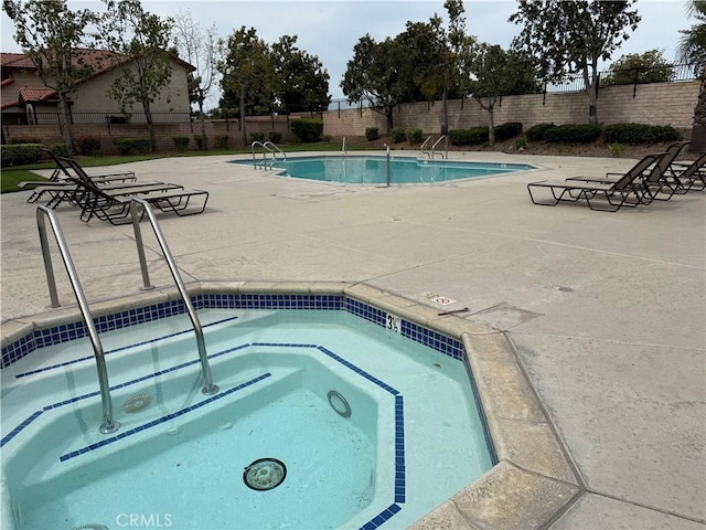 1254 W Van Koevering St, Rialto, CA 92376 - community pool featuring a patio and a community hot tub