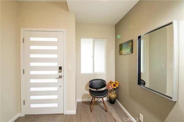 5427 Noble Ave, Sherman Oaks, CA 91411 - foyer entrance with light wood-style floors and baseboards