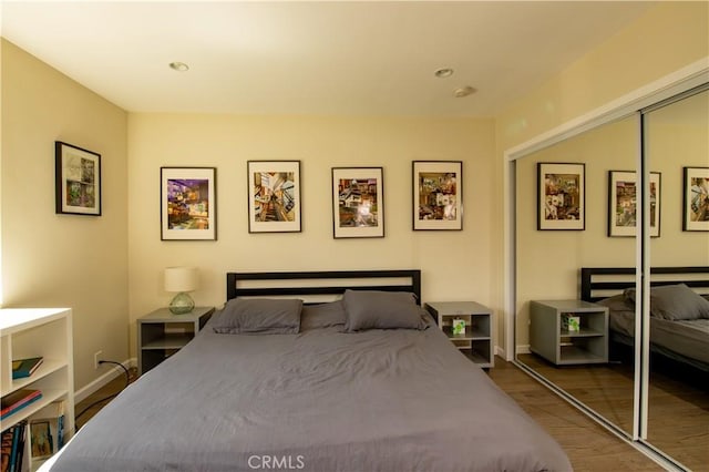 5427 Noble Ave, Sherman Oaks, CA 91411 - bedroom featuring wood finished floors, a closet, and recessed lighting