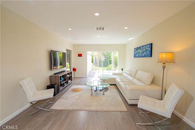 5427 Noble Ave, Sherman Oaks, CA 91411 - living room featuring wood finished floors and recessed lighting