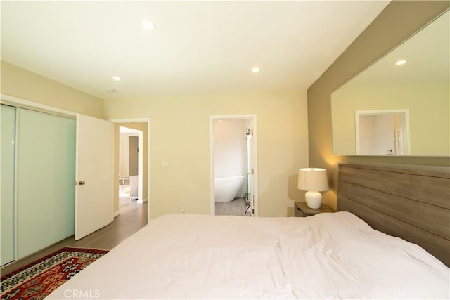 5427 Noble Ave, Sherman Oaks, CA 91411 - bedroom with recessed lighting, a closet, ensuite bath, and wood finished floors