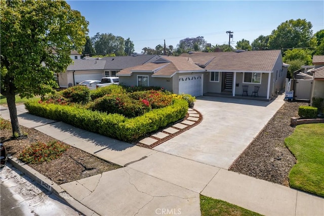 5427 Noble Ave, Sherman Oaks, CA 91411 - ranch-style home featuring an attached garage, driveway, and stucco siding