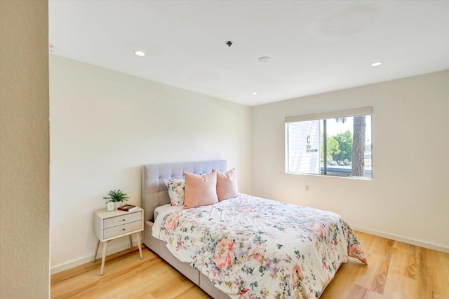 1616 Circa Del Lago Unit C206, San Marcos, CA 92078 - bedroom featuring wood finished floors, baseboards, and recessed lighting