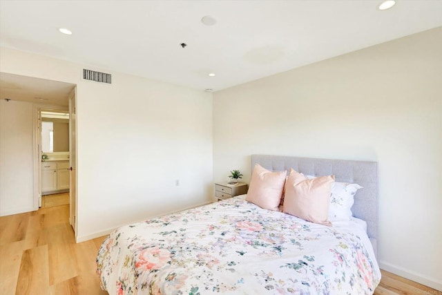 1616 Circa Del Lago Unit C206, San Marcos, CA 92078 - bedroom featuring light wood-style flooring and recessed lighting
