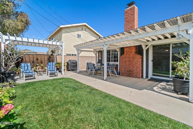1350 Elder St, Oxnard, CA 93036 - back of property featuring a patio area, a pergola, a chimney, and stucco siding