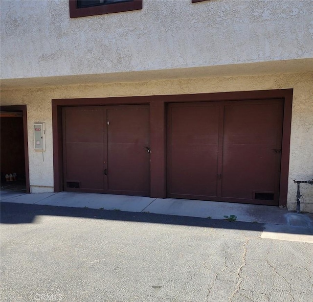 27971 Sarabande Ln Unit 230, Canyon Country, CA 91387 - garage with electric panel