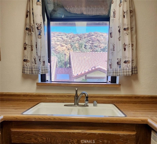 27971 Sarabande Ln Unit 230, Canyon Country, CA 91387 - detailed view of a sink and a textured wall