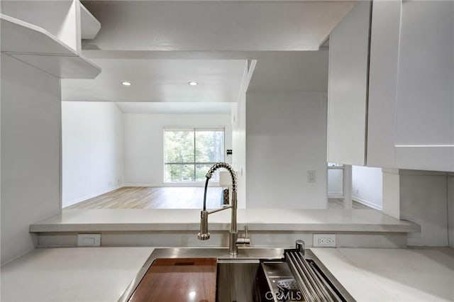 23391 Park Sorrento Unit 62, Calabasas, CA 91302 - kitchen with light countertops and recessed lighting
