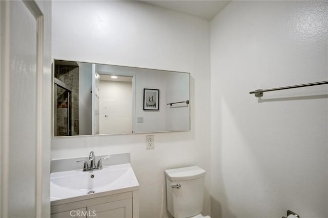 23391 Park Sorrento Unit 62, Calabasas, CA 91302 - bathroom with vanity, toilet, and an enclosed shower