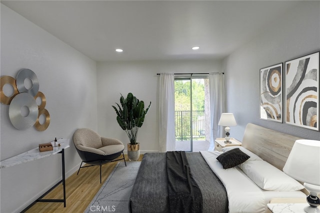 23391 Park Sorrento Unit 62, Calabasas, CA 91302 - bedroom featuring wood finished floors, access to outside, and recessed lighting