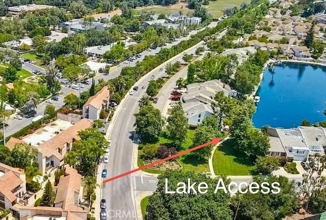 23391 Park Sorrento Unit 62, Calabasas, CA 91302 - aerial perspective of suburban area with a nearby body of water