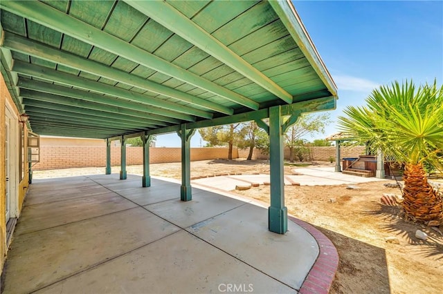 3065 Sabre St, Rosamond, CA 93560 - fenced backyard with a patio area and a hot tub