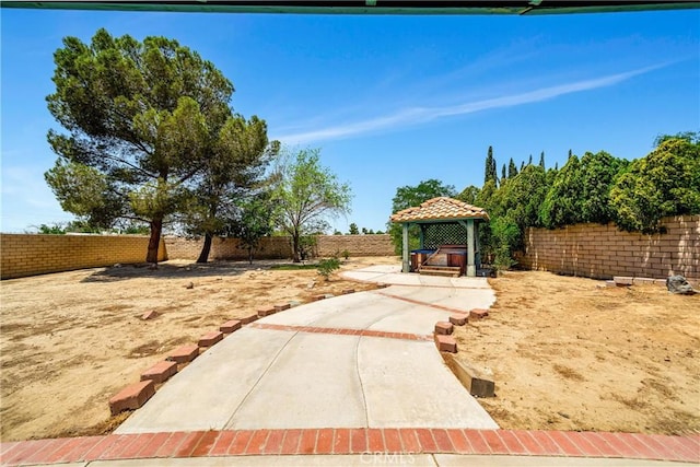 3065 Sabre St, Rosamond, CA 93560 - fenced backyard with a gazebo and a patio