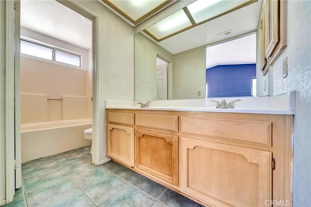 3065 Sabre St, Rosamond, CA 93560 - bathroom with toilet, double vanity, shower / washtub combination, and tile patterned flooring