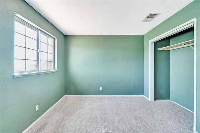 3065 Sabre St, Rosamond, CA 93560 - unfurnished bedroom featuring carpet flooring, baseboards, and a closet