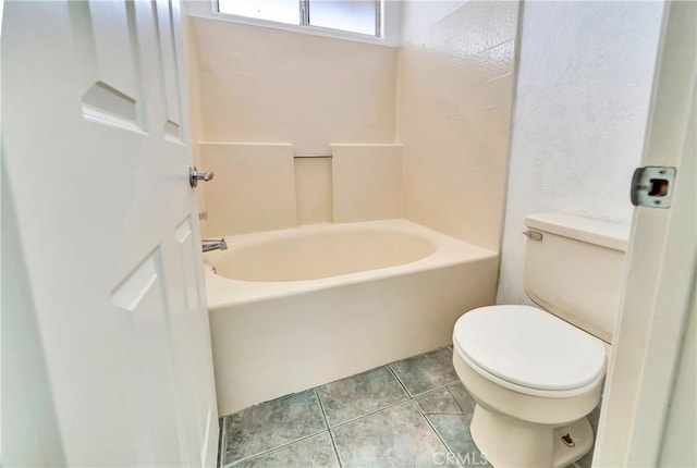 3065 Sabre St, Rosamond, CA 93560 - bathroom with toilet, tile patterned floors, and  shower combination
