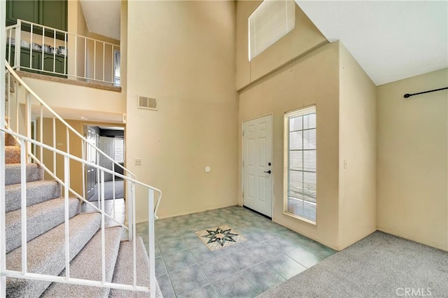 3065 Sabre St, Rosamond, CA 93560 - foyer featuring a towering ceiling and stairs