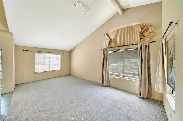 3065 Sabre St, Rosamond, CA 93560 - unfurnished living room featuring track lighting and carpet floors