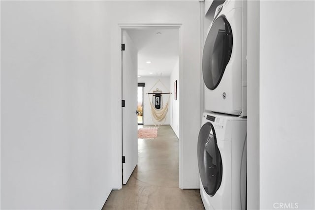 64177 Sullivan Rd, Joshua Tree, CA 92252 - laundry room featuring stacked washer / drying machine and recessed lighting