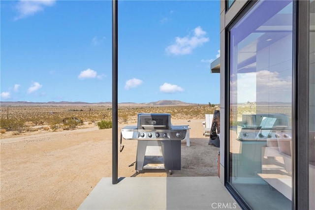 64177 Sullivan Rd, Joshua Tree, CA 92252 - view of patio featuring a mountain view, view of desert, and grilling area