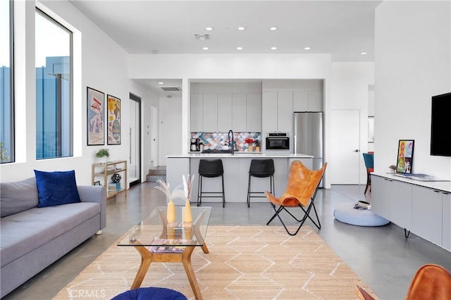 64121 Sullivan Rd, Joshua Tree, CA 92252 - living room with finished concrete flooring and recessed lighting