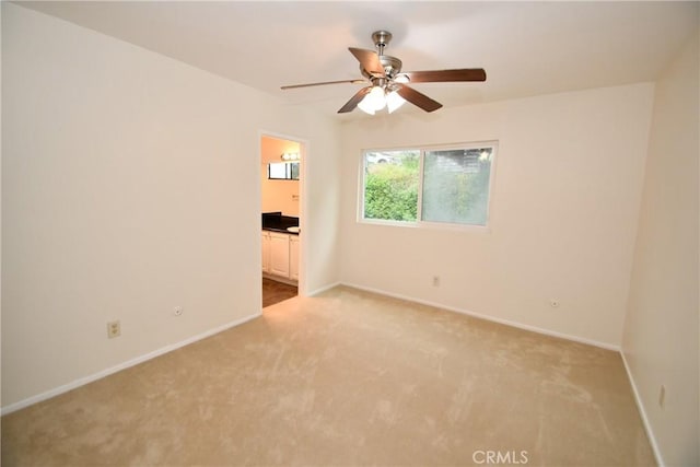 1069 Donahue St, San Diego, CA 92110 - empty room with light colored carpet and ceiling fan