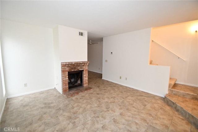 1069 Donahue St, San Diego, CA 92110 - unfurnished living room with stairway and a brick fireplace