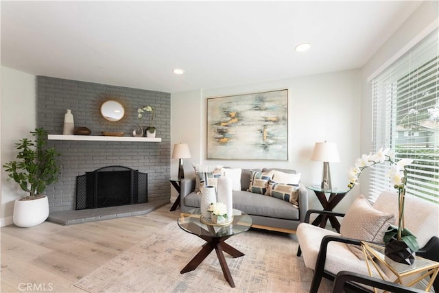 19847 Coventry Ln, Huntington Beach, CA 92646 - living room with wood finished floors, a fireplace, and recessed lighting