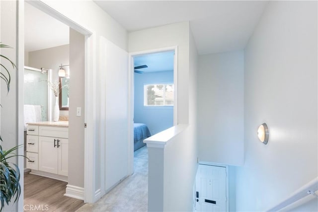 19847 Coventry Ln, Huntington Beach, CA 92646 - hall with light wood-type flooring and baseboards