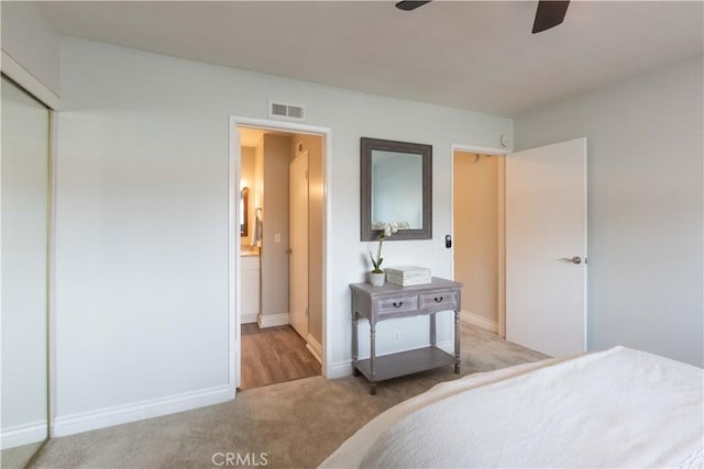 19847 Coventry Ln, Huntington Beach, CA 92646 - bedroom with carpet, ensuite bath, a closet, and a ceiling fan