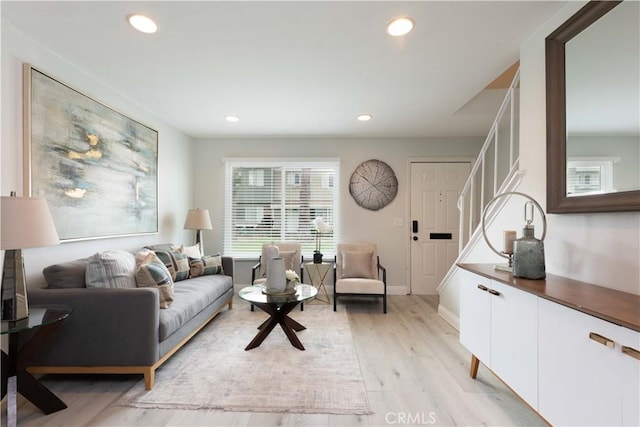 19847 Coventry Ln, Huntington Beach, CA 92646 - living area with light wood-style floors, recessed lighting, and stairway