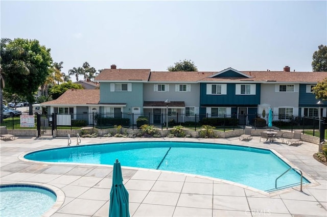 19847 Coventry Ln, Huntington Beach, CA 92646 - community pool featuring a patio area