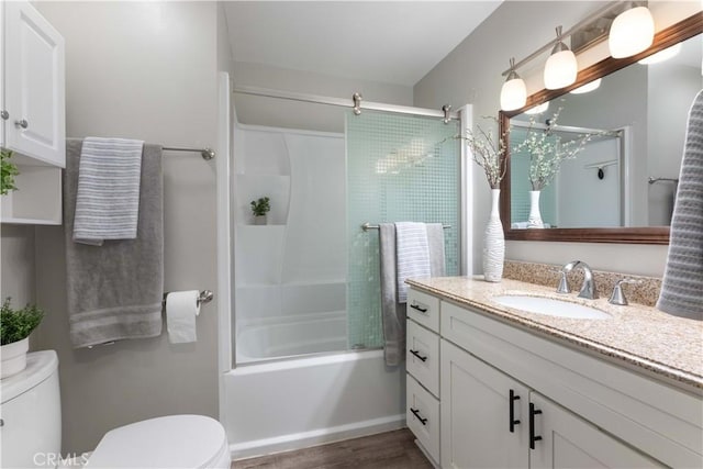 19847 Coventry Ln, Huntington Beach, CA 92646 - full bathroom featuring vanity, combined bath / shower with glass door, and wood finished floors