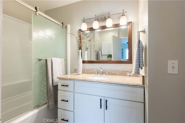 19847 Coventry Ln, Huntington Beach, CA 92646 - bathroom featuring vanity and bath / shower combo with glass door