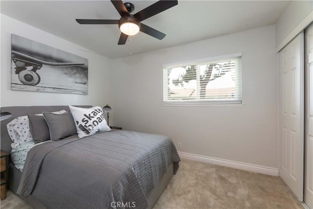 19847 Coventry Ln, Huntington Beach, CA 92646 - bedroom featuring light colored carpet, a closet, and a ceiling fan
