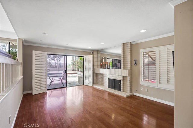 20905 Running Branch Rd, Diamond Bar, CA 91765 - unfurnished living room featuring baseboards, wood finished floors, a fireplace, ornamental molding, and recessed lighting