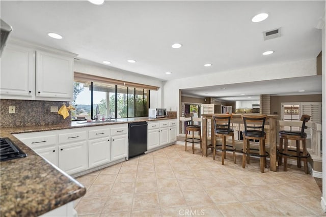 20905 Running Branch Rd, Diamond Bar, CA 91765 - kitchen with dishwasher, a sink, recessed lighting, tasteful backsplash, and white cabinets
