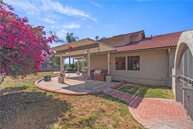 20905 Running Branch Rd, Diamond Bar, CA 91765 - rear view of house with a patio area, stucco siding, a lawn, a tiled roof, and a pergola